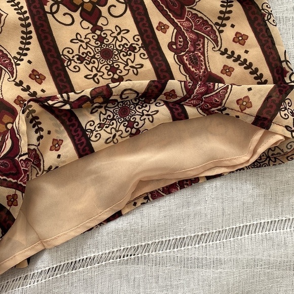 Forever 21 long sleeve boho jumpsuit with plunging neck line. - Picture 7 of 13